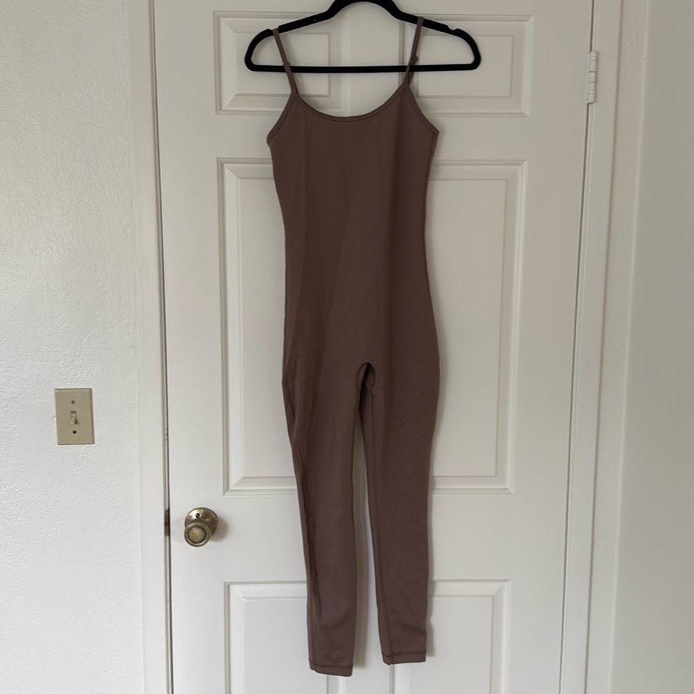TNA butter onesie - NWOT - never worn